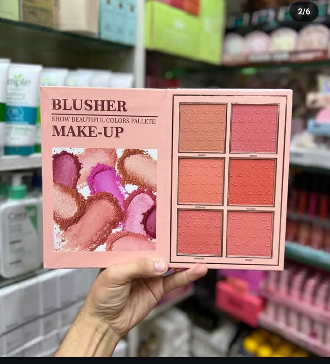 Blusher palette held in hand featuring six beautiful shades, perfect for enhancing your makeup looks.